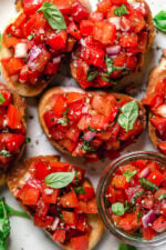 Bruschetta with Tomato and Basil, one of my favorite ways to use up all my summer tomatoes is with this simple appetizer or side dish.