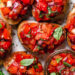 Bruschetta with Tomato and Basil, one of my favorite ways to use up all my summer tomatoes is with this simple appetizer or side dish.