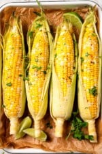 Microwaved corn on the cob with cilantro and chile seasoning.