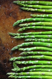 This quick and easy recipe for oven roasted asparagus is the perfect spring side dish. This basic recipe can be seasoned many different ways; add lemon juice, garlic or shaved parmesan for variations.