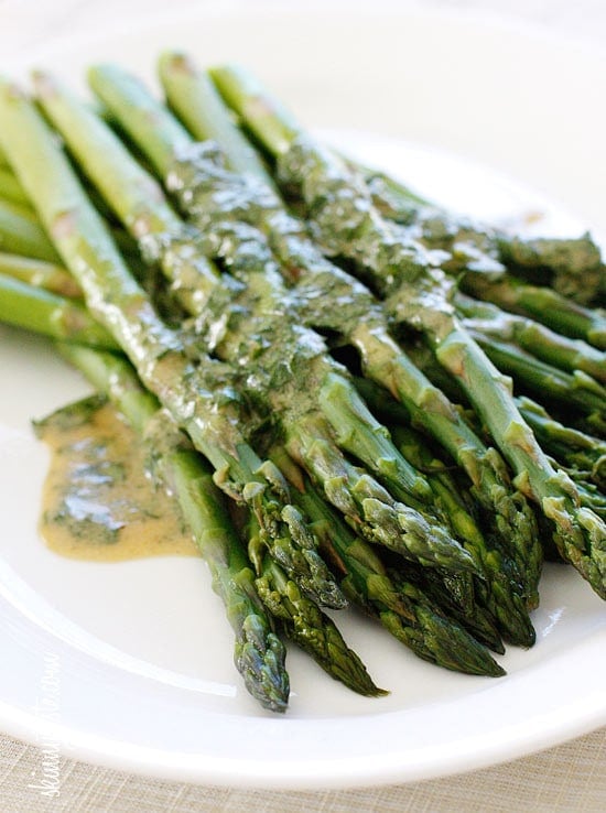 A simple asparagus side dish that really celebrates Spring. Serve it cold or room temperature, leftovers are wonderful chopped and mixed into a salad.