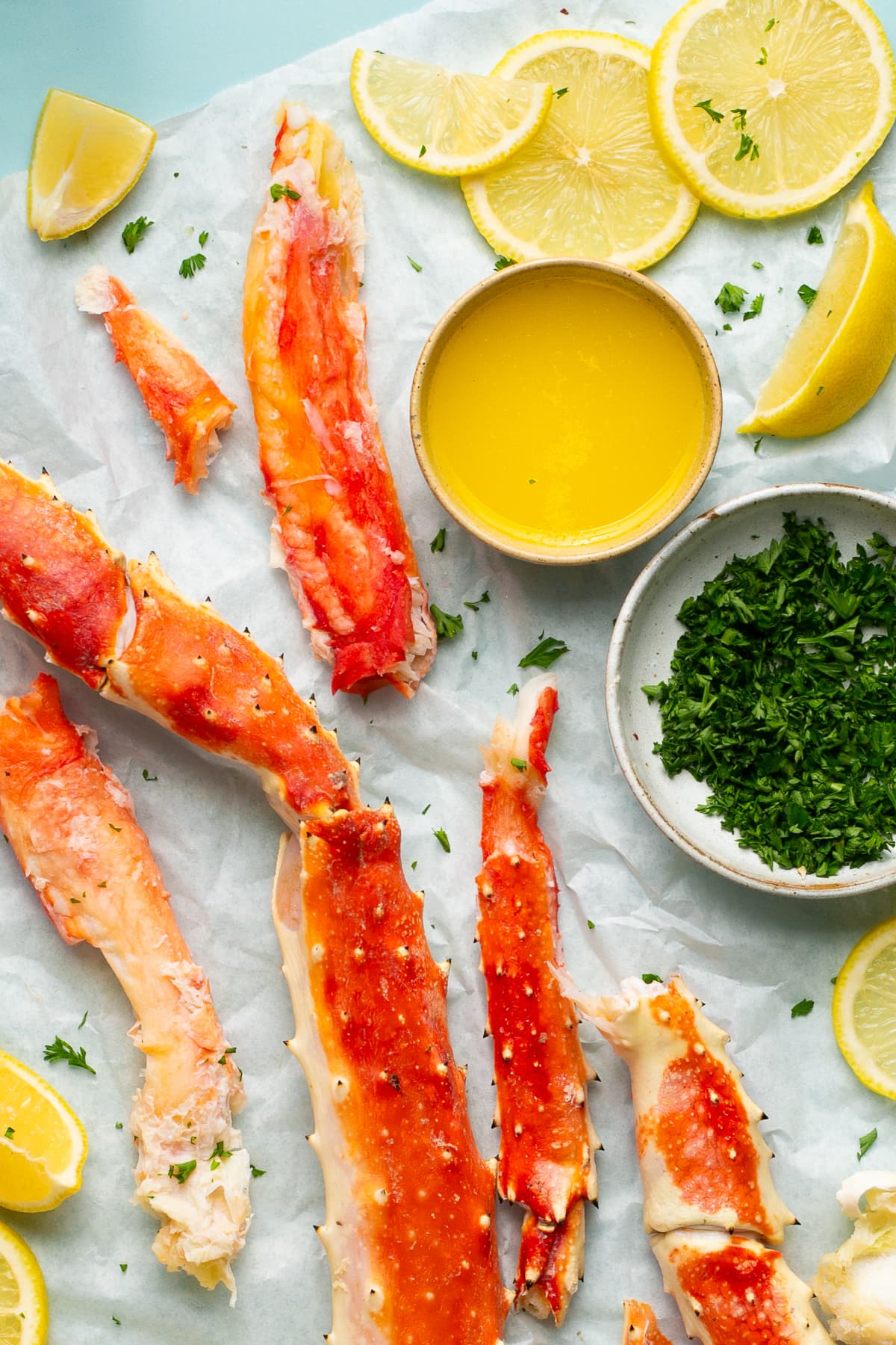 King Crab Legs with butter and lemon wedges