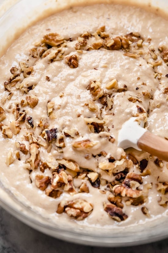 Banana Bread batter in a bowl with nuts