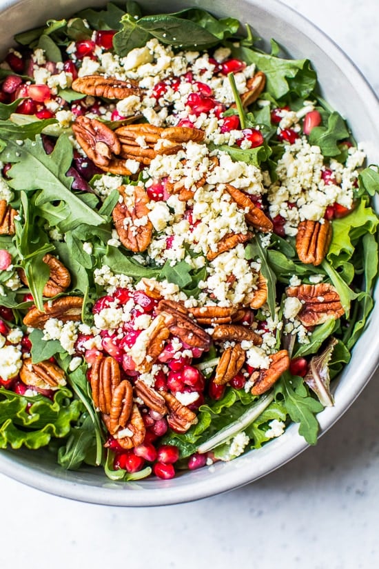This beautiful, delicious fall or winter salad is made with mixed baby greens, pomegranate, gorgonzola and pecans with a pomegranate vinaigrette.