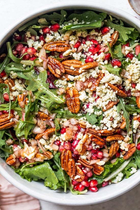 This beautiful, delicious fall or winter salad is made with mixed baby greens, pomegranate, gorgonzola and pecans with a pomegranate vinaigrette.