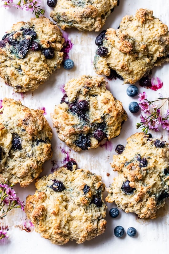 Lightened up, warm blueberry scones right out of the oven make the perfect Sunday morning breakfast along with a hot cup of tea.