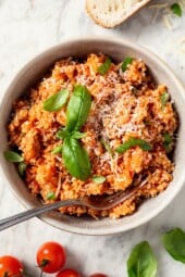 Bowl of quinoa risotto with fork.