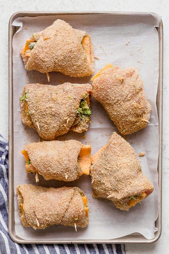 Broccoli and Cheese Stuffed Chicken is filled with cheddar and broccoli, then rolled up, breaded and baked in the oven or air fryer!