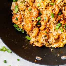 Spicy Shrimp Fried Rice made healthier using leftover cooked brown rice, a delicious whole grain that's high in fiber, so it fills you up.