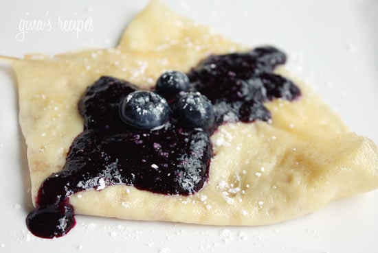 Crepes topped with blueberry compote