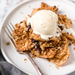 This easy, Cinnamon Apple Crisp is perfect for fall, lightly sweetened with raisins and honey with a crisp, oat topping.
