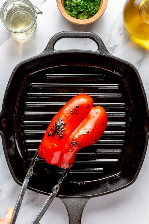 charring reddish peppers