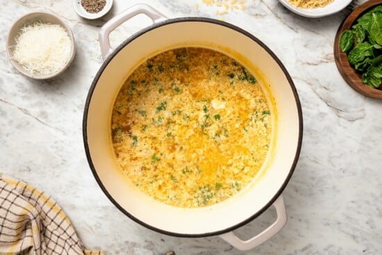 Pot of stracciatella soup before adding spinach.