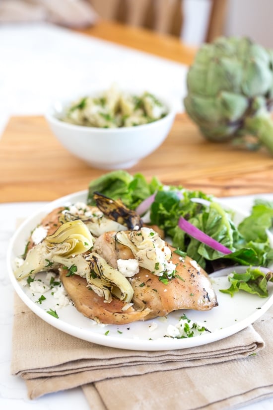 Chicken Thighs with Artichoke Hearts and Feta Cheese is made with just a few ingredients and is ready in less than 30 minutes!