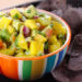 This avocado and mango salsa is a light and colorful party dish with chips. The combination of flavors, sweet and salty with tangy hint of lime makes this a winner. This is also great over grilled fish or chicken!
