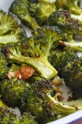 Here's a great way to make broccoli if you are tired of making it the same old way. Roasting broccoli with garlic creates a sweet, nutty delicious flavor and the aroma that wafts through your kitchen will make everyone asking when's dinner ready.