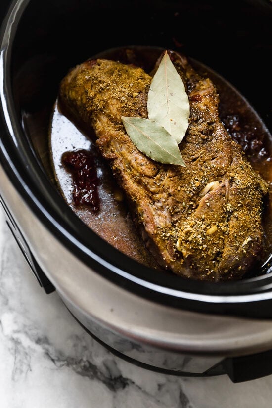 Slow cooked until tender then crisped in the oven, these pork carnitas are practically effortless to make and perfect for meal prep. Seasoned pork shoulder in crockpot with bay leaves.