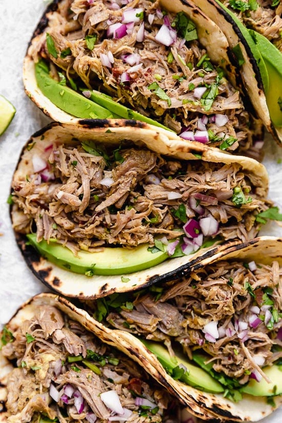 Slow pot pork carnitas or Mexican shredded pork are the best Mexican pork recipe, whether you stuff it into a tortilla, taco or turn it into a burrito bowl!
