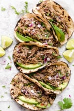 Slow Cooker Pork Carnitas or Mexican Pulled Pork is the best Mexican pork recipe whether you stuff it into a tortilla, taco or turn it into a burrito bowl!