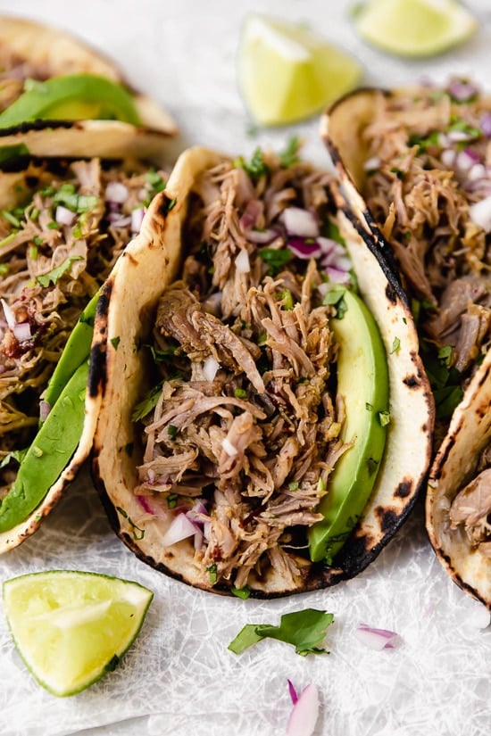 Slow Cooker Pork Carnitas or Mexican Pulled Pork is the best Mexican pork recipe, whether you stuff it into a tortilla, taco or turn it into a burrito bowl!