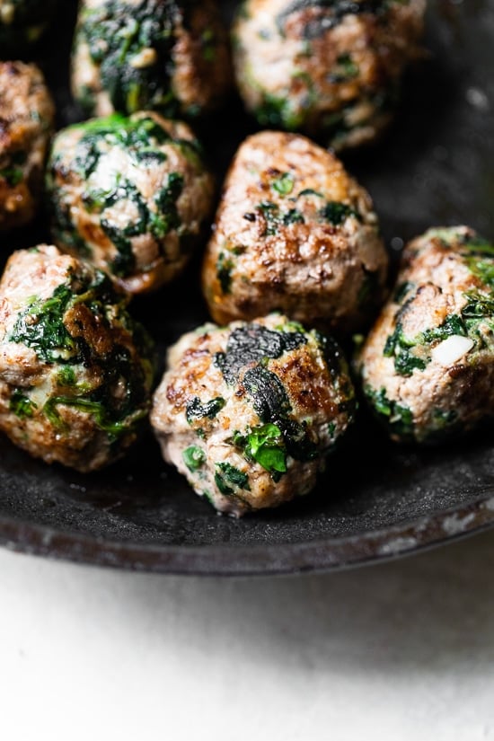 Beef meatballs with spinach.
