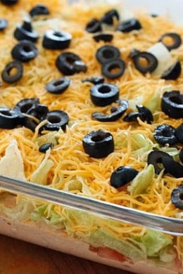 This super easy, no cook skinny taco dip is a MUST have at any get together: birthdays, football, holidays– the dip always disappears! Serve with tortilla chips.