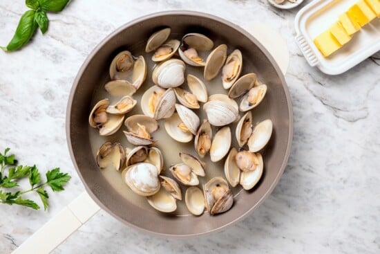 Skillet of steamed clams.