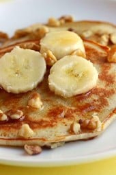Calling all banana lovers to these low fat, whole wheat banana nut pancakes, rich in potassium, fiber and flavor – tastes like banana nut bread in a pancake!