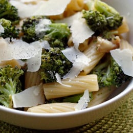 This easy and quick pasta dish is a guaranteed way to get picky eaters to love their broccoli, just roast it with garlic and olive oil!