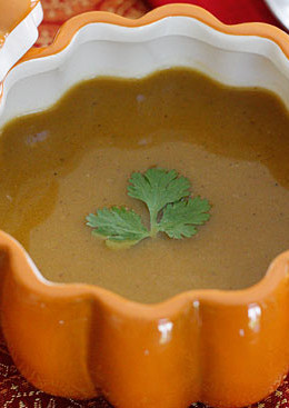 Coconut milk, curry, cumin and other Indian spices really compliment the flavor of the butternut squash in this savory soup. This may be my new favorite way to eat butternut squash.