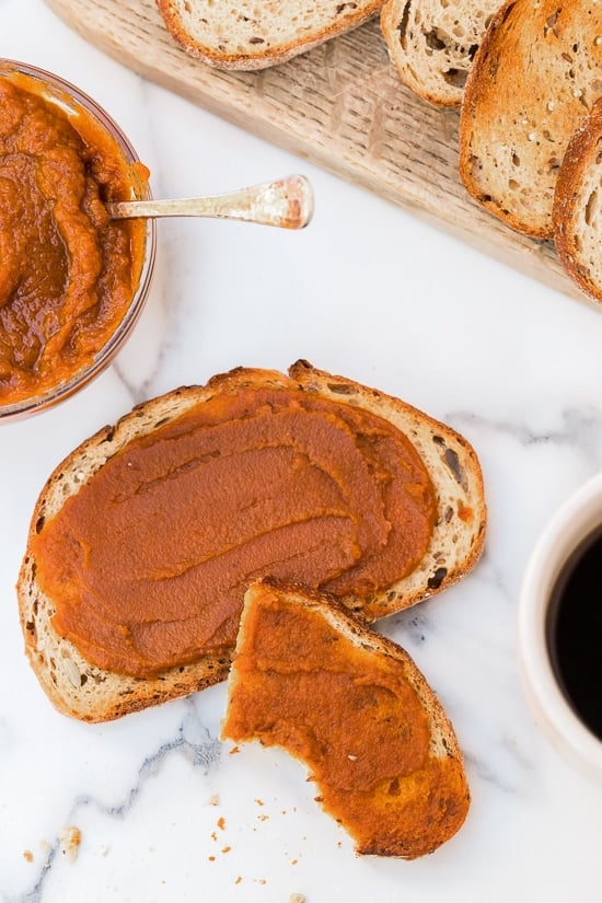 Pumpkin lovers will love this easy, pumpkin butter recipe made from scratch. It's like pumpkin pie in a jar, only better! Delicious smeared on toast, oatmeal, yogurt, and more!