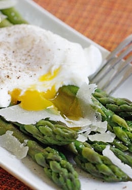 Poached eggs, asparagus, kosher salt, fresh pepper and shaved Pecorino Romano. This simple egg dish is delicious for breakfast, lunch or brunch. You can serve this with whole grain toast on the side.
