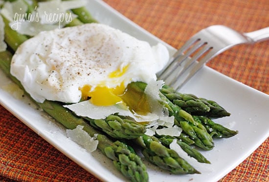 Poached eggs, asparagus, kosher salt, fresh pepper and shaved pecorino romano. This simple egg dish is perfect for breakfast, lunch or brunch. It can be served with whole grain toast on the side.