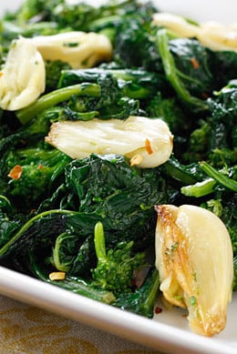 Broccoli Rabe roasted with chunks of garlic and oil and a touch of crushed red pepper flakes.