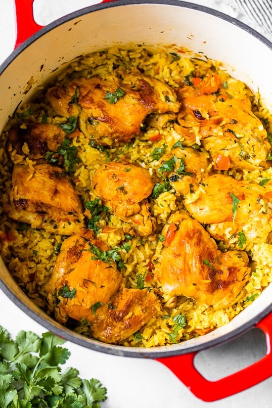 Authentic Arroz Con Pollo, or Latin chicken and rice, is the ultimate one-pan meal. It’s a classic Colombian dish that I grew up on that I now love to cook for my family.