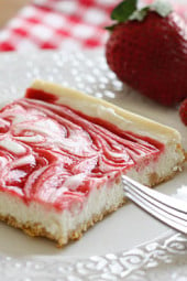 Strawberry Swirl Cheesecake – A low fat cheesecake swirled with strawberry jam on a graham cracker crust.