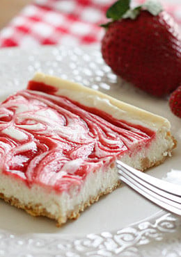 Strawberry Swirl Cheesecake – A low fat cheesecake swirled with strawberry jam on a graham cracker crust.