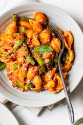 Baby Pasta Shells with Asparagus and Marinara Sauce is a quick and easy 4-ingredient pasta dish, perfect for Spring. Ready in under 15 minutes and under ten dollars to make.