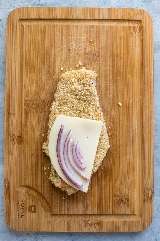 Chicken filled with mozzarella, onion and proscuitto