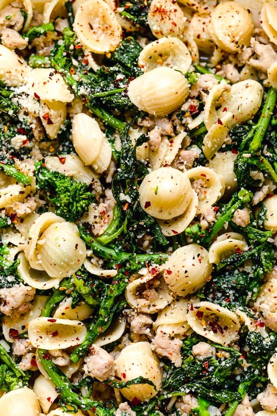 Orecchiette Pasta with Sausage and Broccoli Rabe uses chicken sausage in place of pork and a whole lot of garlic! This lightened up version will not disappoint!!