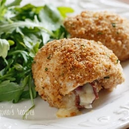 Chicken cutlets dipped in lemon and olive oil, gently coated in a combination of bread crumbs and romano cheese then rolled with prosciutto, cheese and red onion and baked until golden.