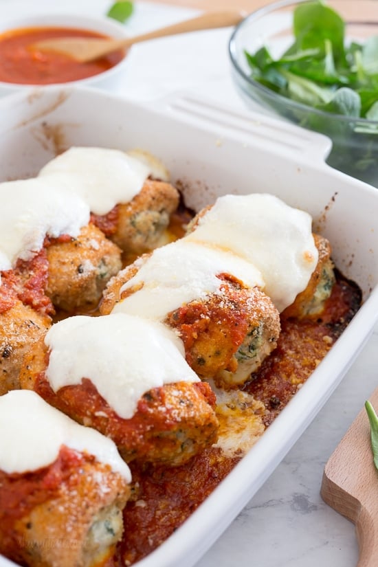 Baked chicken breasts filled and rolled with spinach and ricotta topped with Pomodoro sauce and melted mozzarella. Family friendly and so good! 