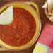 This spicy red salsa is made with fresh tomatoes, roasted jalapeño, garlic and cilantro, pureed in a blender then simmered until the tomatoes deepen in color. Serve with your favorite baked chips and Sinless Margaritas!