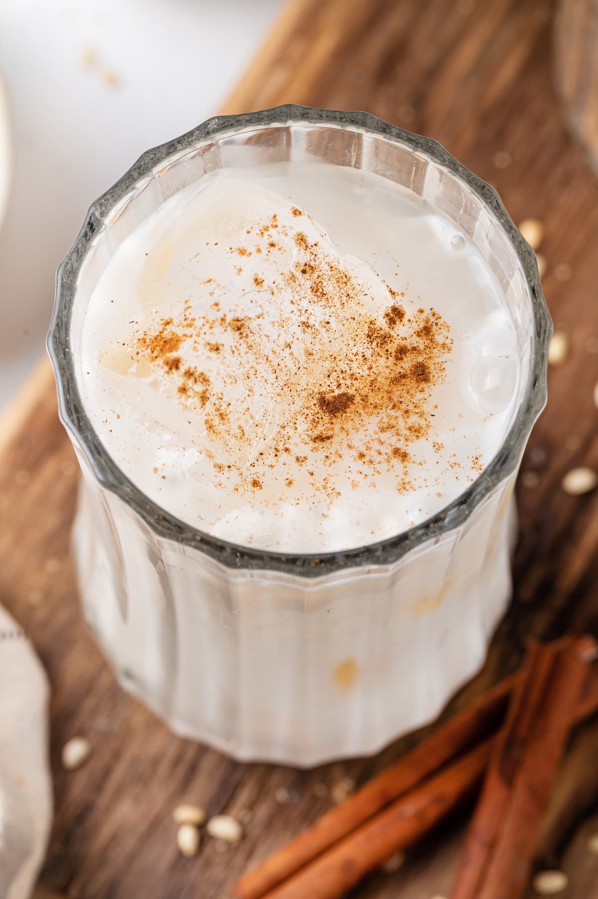 Angled overhead view of a glass of horchata