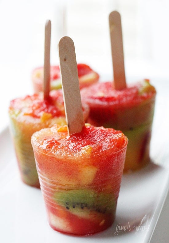 Freezing fresh fruit with a splash of juice makes for a fresh and healthy snack. Use whatever fruit you're heart desires. A perfect summer treat!