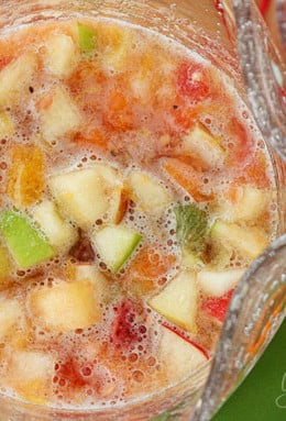 Salpicón is a fresh homemade Colombian fruit beverage. It's served cold and loaded with chopped fruit such as watermelon, papaya, strawberries, pineapple, oranges, apples, bananas and carbonated soda.