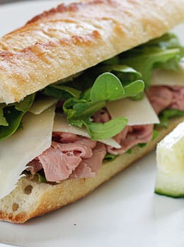 Crusty bread, peppery arugula and fresh shaved Parmesan cheese makes an everyday cold cut like roast beef taste like a gourmet sandwich.