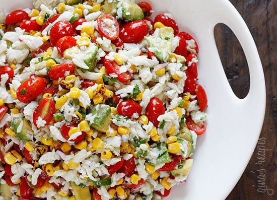 A wonderful summer salad made with lump crab meat, summer tomatoes, sweet charred roasted corn, cilantro, hot peppers and zesty lime juice. Serve this over mixed greens or tostadas as a main dish or you can put this in martini glasses as a fancy appetizer.