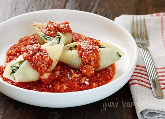 Jumbo pasta shells stuffed with ricotta cheese, mozzarella and spinach topped with a turkey meat sauce. Here's a great way to sneak spinach on your kids' plate!