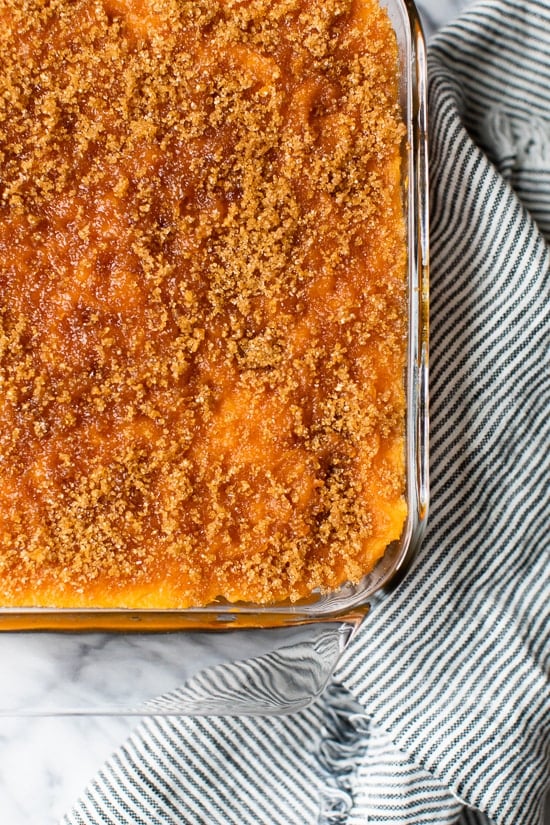 Mashed Sweet Potatoes Brulee are seasoned with with a hint of cinnamon and nutmeg topped with a caramelized brown sugar crust.